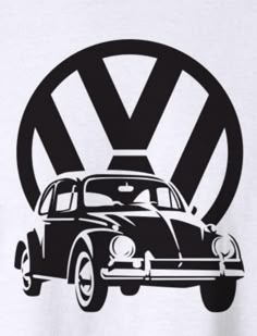 an old vw bug in front of the word volkswagen on a white t - shirt