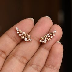 "An exclusive piece from our shop, these earrings are absolutely to die for..! Special Earrings for your special day. A bunch of beautiful natural white, light brown and dark brown diamonds, hand picked and arranged in a grand symphony! Your heart will surely skip a beat.. Ours did.. :) * Gemstone : Natural White & Champagne Diamonds (Untreated) * Total Diamond Wt. : 0.86 Ct * Clarity Grade : Vs-Si * Gold - 14k, 2.5gm ROSE gold (approx.) If you like this earring, please press \"Pin it\" butt Champagne Diamond Earrings, Special Earrings, Gold Ear Climbers, Brown Diamonds, Diamond Ear Cuff, Ear Crawlers, Ear Climbers, Brown Diamond, Champagne Diamond