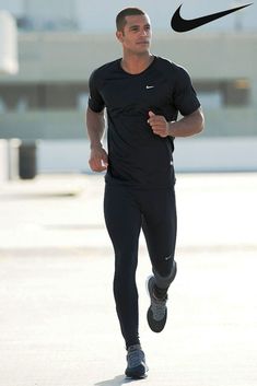 a man running with the nike logo above his head