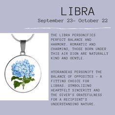 a necklace with blue flowers on it and the words libra written in white letters