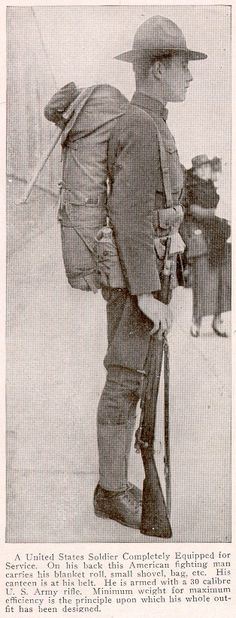 an old black and white photo of a man in uniform with his back to the camera