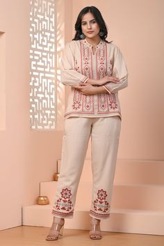 Stay stylish in our exclusive beige cotton co-ord set with exquisite embroidery details and relaxed sleeves. This comfortable and elegant daywear is perfect for any casual outing, work, or even a relaxed evening. Made from high-quality cotton fabric, the outfit offers superior comfort and ease of movement. The relaxed sleeves offer ample ventilation, while the intricate embroidery adds to its charm. With this versatile piece, you can switch up your style from traditional to modern. Pair it with Merlot Color, Intricate Embroidery, Co Ord Set, Embroidery Details, Co Ord, Ethnic Fashion, Green Cotton, Beige Color, Timeless Beauty