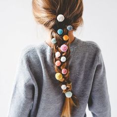 The perfect way to wear a pom pom! Our super popular Pom pom ponies have been updated for this season. A pack of 3 medium sized 30mm pom poms in teal, mustard and soft peach, attached to a matching coloured pony elastic. These look absolutely adorable in a top knot, pony or pigtails and are a great way to add a subtle little pop of colour to an outfit. 3 in a pack Warning! Not suitable for children under 36 months Dress Down Day, Mini Pom, Crazy Hair Days, Plaits, Crazy Hair, Hair Dos, Pom Poms, Hair Day, Kids Hairstyles