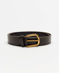 Our Distressed Leather Belt is subtly textured and versatile, dressing up or down. It’s one ½” width cut from .3mm thick calfskin leather that withstands daily wear and only gets better with time. It’s finished with a rounded, solid brass buckle and our signature heirloom ribbon stripe clamshell on the backside. Billy Reid, Belt Brown, Brass Buckle, Distressed Leather, Leather Belt, Solid Brass, Calf Skin, Daily Wear, Buckle