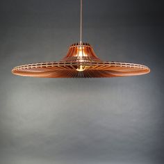 an unusual light fixture hanging from a ceiling