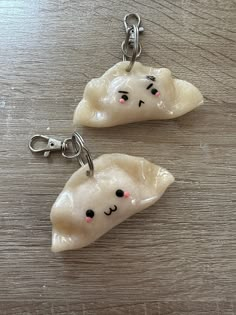 two pieces of food that have been shaped to look like teeth with faces on them