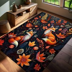 an area rug with flowers and birds on it in front of a wooden table next to a window