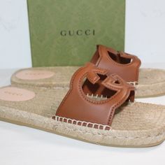 All Of My Items Are Guaranteed 100% Authentic You Are Looking At A Beautiful Designer Pair Of Sandals Made By Gucci Size 40.5 Heels .75" Leather Uppers And Accented With Cut Out Interlocking Ggs Brand New With Box, Gucci Cards And Dust Bag Gucci Open Toe Calf Leather Sandals, Gucci Calf Leather Open Toe Sandals, Gucci Leather Sandals With Branded Heel Counter, Gucci Sandals With Buckle Closure For Summer, Gucci Calf Leather Sandals For Summer, Gucci Summer Calf Leather Sandals, Gucci Leather Flat Sandals, Gucci Leather Sandals Flat Heel, Designer Slip-on Sandals With Branded Insole