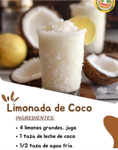 an advertisement for a drink with coconuts and lemons in the background, on a table