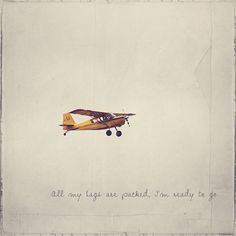 an old airplane flying in the sky with writing on it that says, all my light are quiet i'm ready to go