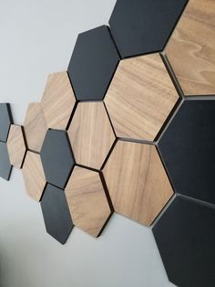 some black and brown hexagonal tiles on the wall