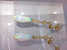 A very attractive pair of 9ct gold and opal drop earrings / ear pendants. As you can see these are absolutely stunning, the main colours shown in the opals are green and pink. Perfect condition Marked for 9ct gold Each earring measures 3.2cm from the stud / gold ball top to the bottom of the opal. Opal Earrings Vintage, Opal Gemstone Drop Earrings, Elegant Opal Gemstone Drop Earrings, Pink Opal Drop Earrings, Elegant Adjustable Opal Earrings, Pink Opal Jewelry, Opal Drop Earrings, Pink Opal, Opal Jewelry