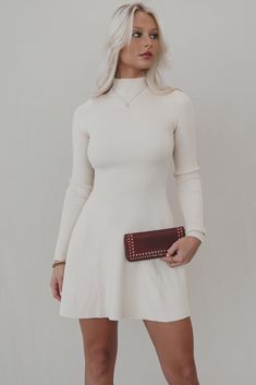 Oh yeah we can see it. See ourselves with an iced coffee in this beautiful flattering mini dress. High neck cream fit and flare long sleeve mini dress, lightweight sweater material, not lined Material is Polyester Hang to dry Model is 5'7 wearing a small SHOP THE LOOK Small Medium Large Length 32" 33" 34" Bust 9" 10" 11" Wedding Guest Romper, Cream Sweater Dress, Party Bottoms, Dress High Neck, Flare Long Sleeve, Neck Cream, Amazing Lace, Eclectic Fashion, Oh Yeah