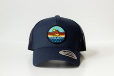 Mountains - Trucker Hat - Navy Blue 65/35 polyester/cotton Mesh back, structured Mid-profile, six-panel Snapback closure Blue Cotton Trucker Snapback Hat, Navy Adjustable Baseball Cap For Summer, Fitted Flat Brim Baseball Cap For Outdoor, Fitted Flat-brim Baseball Cap For Outdoor, Navy Trucker Hat With Curved Brim, Blue Six-panel Trucker Hat For Summer, Navy Adjustable Trucker Hat With Curved Brim, Navy Snapback Hat With Curved Brim For Outdoor, Fitted Trucker Hat With Curved Brim For Outdoor