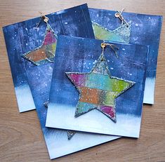 three cards that have been made to look like stars