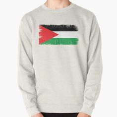 a man wearing a sweatshirt with the flag of jordan painted on it