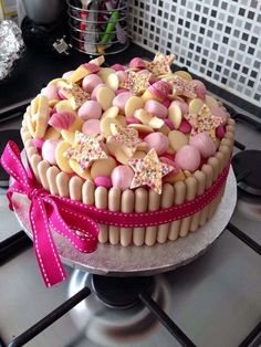 a decorated cake on top of a stove