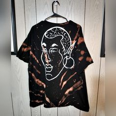 This Upcycled Black Tshirt Has Been Painted And Bleach Dyed By Hand. Comment With Any Questions! Bleached Black T-shirt For Streetwear, Oversized Tie Dye T-shirt With Graphic Print, Oversized Tie Dye Graphic T-shirt, Black Bleached Cotton Tops, Hand Dyed Black Crew Neck T-shirt, Black Bleached Relaxed Fit Tops, Black Bleached Graphic Tee T-shirt, Hand Dyed Black Short Sleeve T-shirt, Hand Dyed Graphic Tee Tops For Streetwear