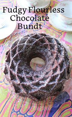 a chocolate bundt cake sitting on top of a table