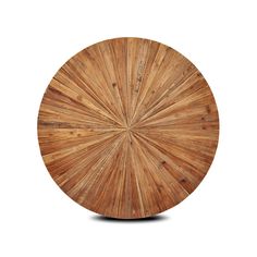 a round wooden table that has been made out of wood