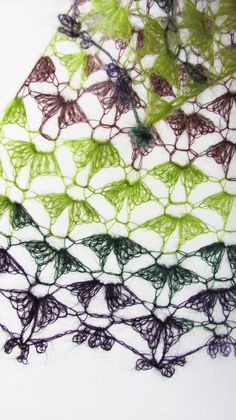 three pieces of crocheted fabric with leaves on them