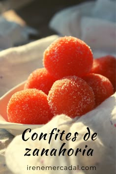 some food is in a white bowl on a table with the words confites de zanaboria