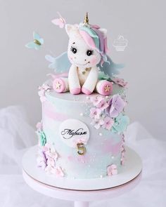 there is a cake that has a unicorn on it