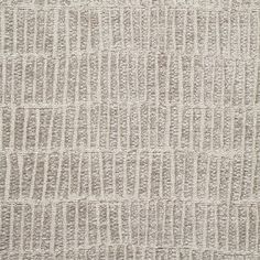 an upholstered textured fabric with vertical lines in grey and white colors, suitable to be used as a background or wallpaper