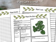 plant care journal with plants and leaves on the pages, in front of a wooden table