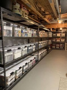 the shelves are filled with many different types of boxes and containers, including file folders