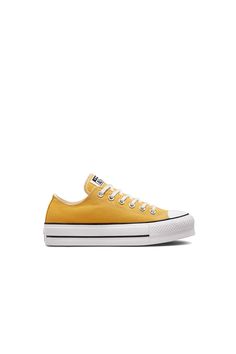 Converse Chuck Taylor All Star Lift Low Top Thriftshop Yellow A double-stacked sole elevates the iconic, Converse look. New, optimistic colors bring a cheerful, spring-ready vibe, while unmistakable Chuck Taylor elements like a diamond pattern outsole and contrast midsole stripes stay grounded in iconic style.  - Low-top platform sneaker with poly-canvas upper  - OrthoLite cushioning for all-day comfort  - New Converse colours to refresh your rotation  - A platform sole ups the height  - Standard woven tongue label and license plate Yellow Converse, Chuck Taylor All Star Lift, Stay Grounded, New Converse, Iconic Style, Karen Walker, Platform Sneaker, Thrift Shopping, Converse Chuck Taylor All Star