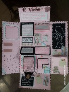 a pink and black bulletin board with some writing on it's back side, surrounded by other items