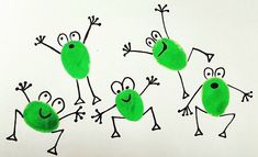 four green children's handprints with faces and hands in the shape of frogs