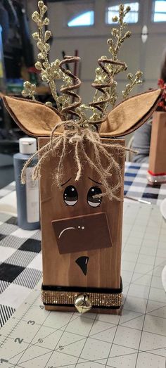 a paper bag with a reindeer face on it