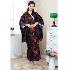 Feel like a real geisha with one of our elegant Japanese kimonos. Traditional Japanese Kimono. Flower Print. Drag queens love our kimonos! Materials: Polyester, rayon Size: One size MEASUREMENTS Length: 50" / 125cm Bust: 46.5" / 118cm Shoulder to shoulder: 22" / 56cm IMPORTANT: Please, measure yourself before placing your order Traditional Japanese Kimono, Kimono Outfit, Kimono Yukata, Kimono Design, Satin Kimono, Gown Pattern, Japanese Dress, Dress Sketches, Japanese Silk