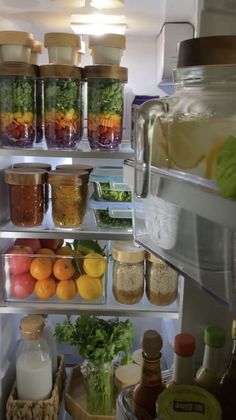 an open refrigerator filled with lots of food