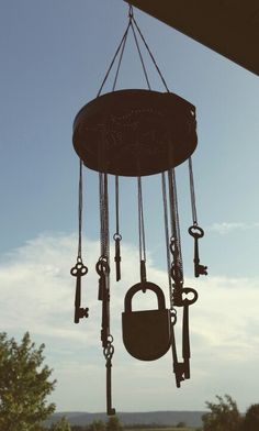 a bunch of keys hanging from a chain