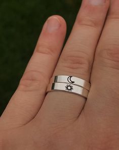 "Matching sun and moon best friend rings, match with your bestie with this adorable dainty ring set. DETAILS: -Two Matching Rings -Each ring is hand stamped -Ring is Sterling Silver -4mm in thickness You will receive two hand-stamped sterling silver rings filled with a black enamel finish. **Every item is handmade, this means that each will be unique and may not look EXACTLY like the picture, but it will look very similar ➡ORDER PROBLEMS If there are any problems with your order please contact m Adjustable Symbolic Stackable Rings As Gift, Adjustable Symbolic Stackable Rings For Gift, White Rings With Sun And Moon Design As Gift, Open Ring With Sun And Moon Design For Gift, Sun And Moon Design Open Ring For Gift, Sun And Moon Design Open Ring As Gift, Adjustable Sun And Moon Design Promise Rings, Sun And Moon Design Open Ring, Celestial Style Adjustable Stackable Rings For Anniversary