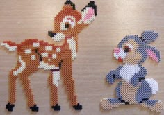 two deer and a rabbit made out of perler beads