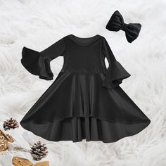 Asymmetrical black velvet winter girl's dress, Black is a timeless color that exudes elegance, making it a perfect choice for the winter season. Your daughter will adore this Black Girl Dress, and she won't want to part with its luxurious feel. The skirt section features a stylish asymmetrical cut, adding a touch of uniqueness to the dress. The sleeves are designed as elegant bell sleeves, enhancing the overall charm of the winter girl's dress. Explore our store to discover an array of distinctive girls' dresses, including birthday dresses and special occasion dresses, crafted with utmost care for your beloved ones. If you're considering this little girl dress as a gift, feel free to message me, and I can include a personalized note. Please share your feedback along with a lovely picture o Toddler Winter Black Dress, Toddler Princess Dress, Robes D'occasion, Girls Black Dress, Asymmetrical Cut, Birthday Girl Dress, Circle Dress, Black Circle, Photoshoot Dress