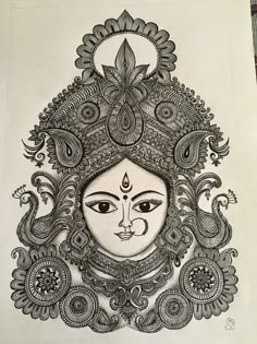 a drawing of a woman's face with intricate designs