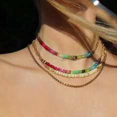 This brilliant and colorful choker is made of precious and rare natural gemstones, arranged to form a rainbow: Tanzanite, Blue Apatite, Topaz, Aquamarine, Peridot, Green Tourmaline, Tsavorite, Chrysoprase, Pink Tourmaline, Pink Sapphire, Ruby, Red Spinel, and Garnet.  This rainbow necklace features gemstones known for their healing properties. They promote vitality, creativity, and emotional healing, balance energy, clear blockages, boost confidence, and foster inner peace. A symbol of harmony, Colorful Chain Necklace, Colorful Choker, Rainbow Choker, Pride Jewelry, Balance Energy, Pride Jewellery, Red Spinel, Fruit Jewelry, Magic Recipe