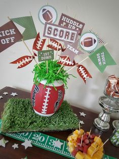 a football themed centerpiece on a table