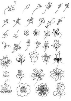 a bunch of flowers that are drawn in black and white