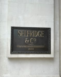 a sign on the side of a building that says seiffridge & c co