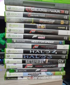 several video games stacked on top of each other