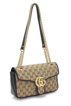 Find GUCCI Gg Canvas Marmont Shoulder Bag on Editorialist. The Gucci GG Canvas Marmont Shoulder Bag features a turn lock closure, a metal chain strap, and a GG monogram pattern. The bag can be worn on the shoulder or crossbody. Gucci Marmont Bag, Gucci Marmont, Gg Monogram, Monogram Pattern, Gucci Bags, Metal Chain, Small Bags, Chain Strap, Gucci Bag