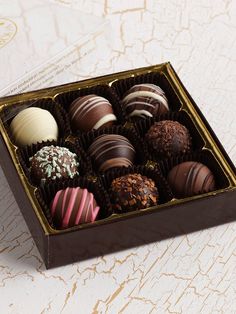 a box of chocolates sitting on top of a table