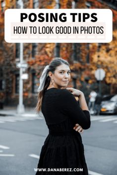 a woman in black dress standing on street corner with her arms crossed and the words posing tips how to look good in photos