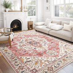 a living room filled with furniture and a large rug on top of a hard wood floor